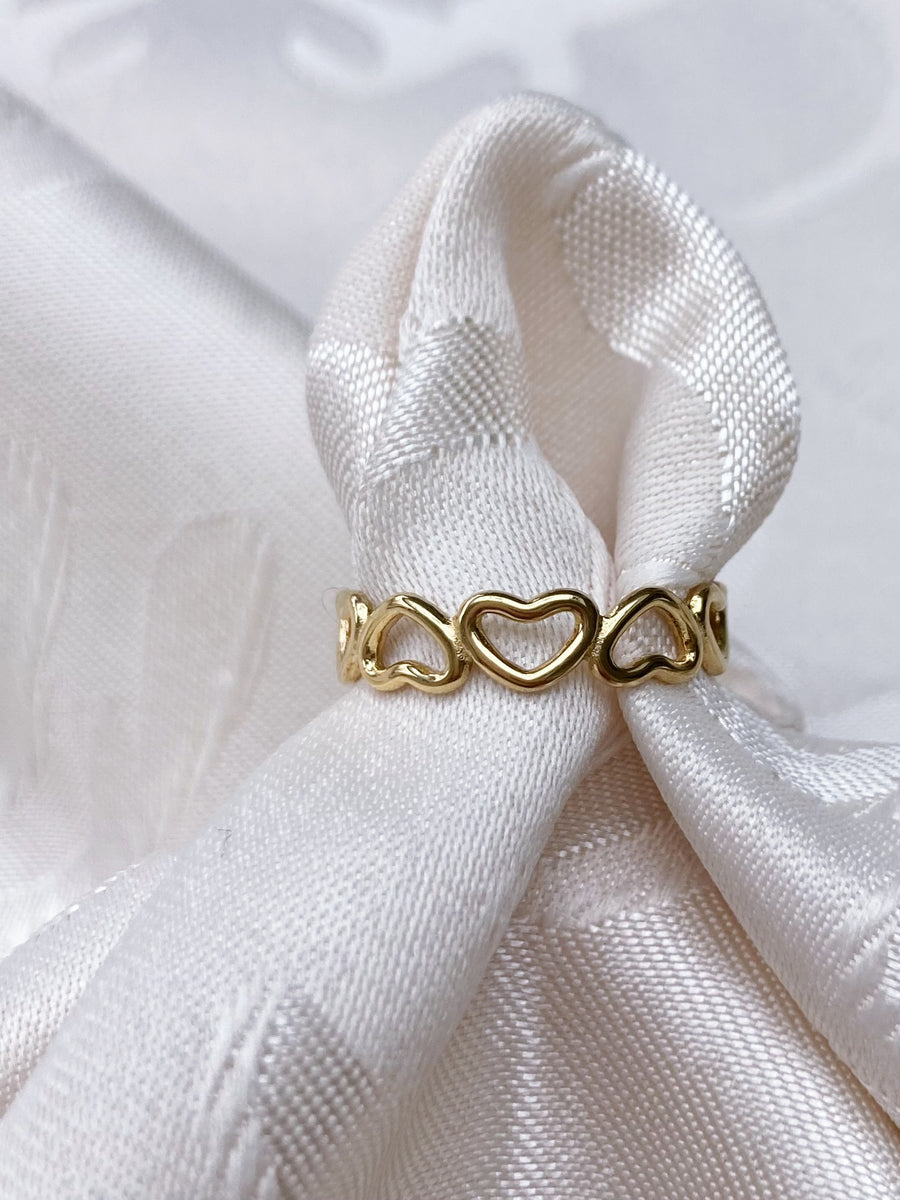 Twisted hearts ring