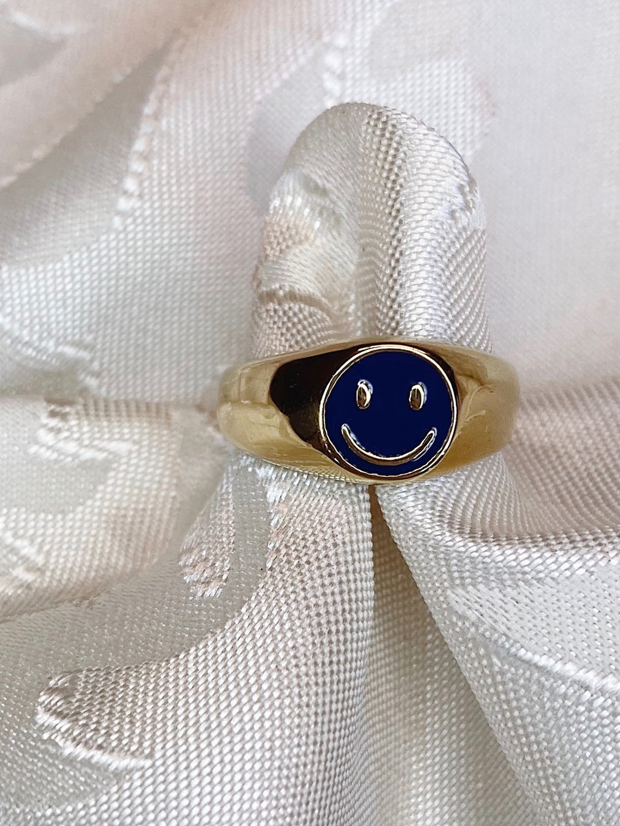 Dark blue smiley ring