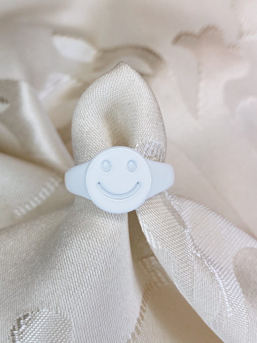 White candy smiley ring