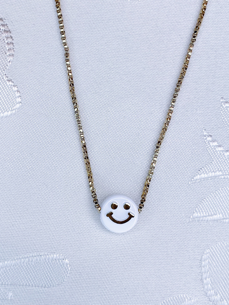 Mini white smiley necklace