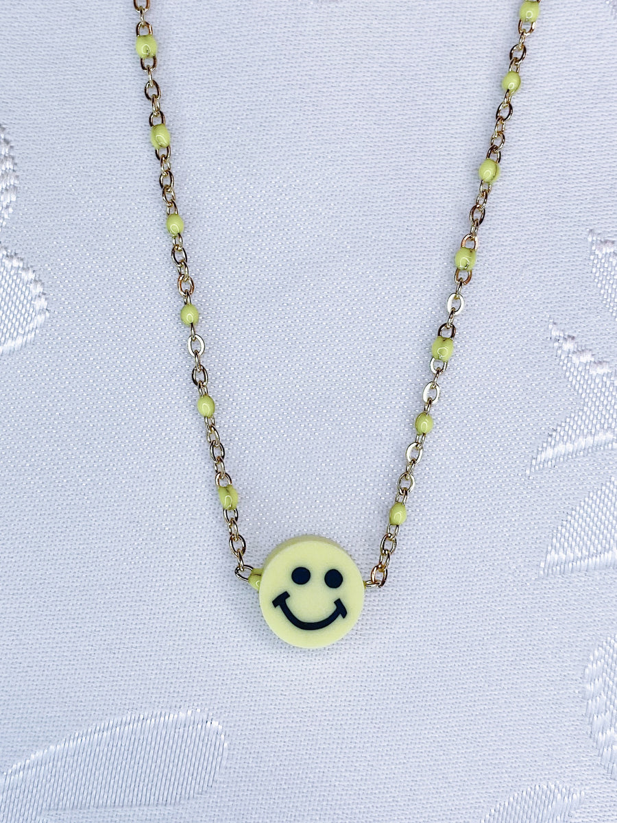 Mini yellow smiley necklace